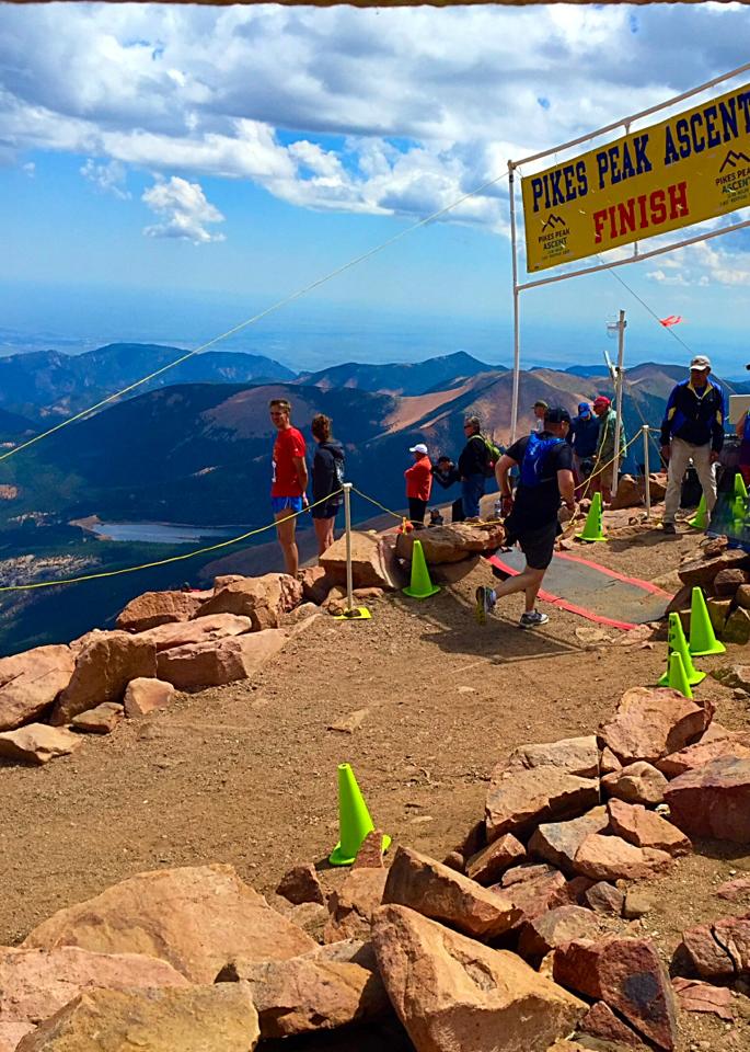 Attorney Josh Keltner completing the Pikes Peak Half Marathon.